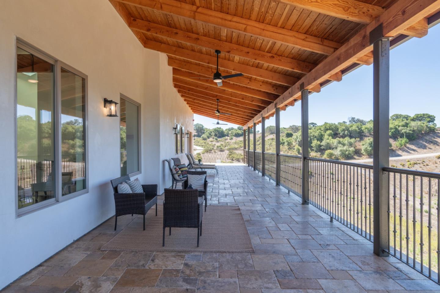 9020 Hidden Canyon Road Salinas, CA 93907 - Photo 26 of 58 a view of a patio with table and chairs