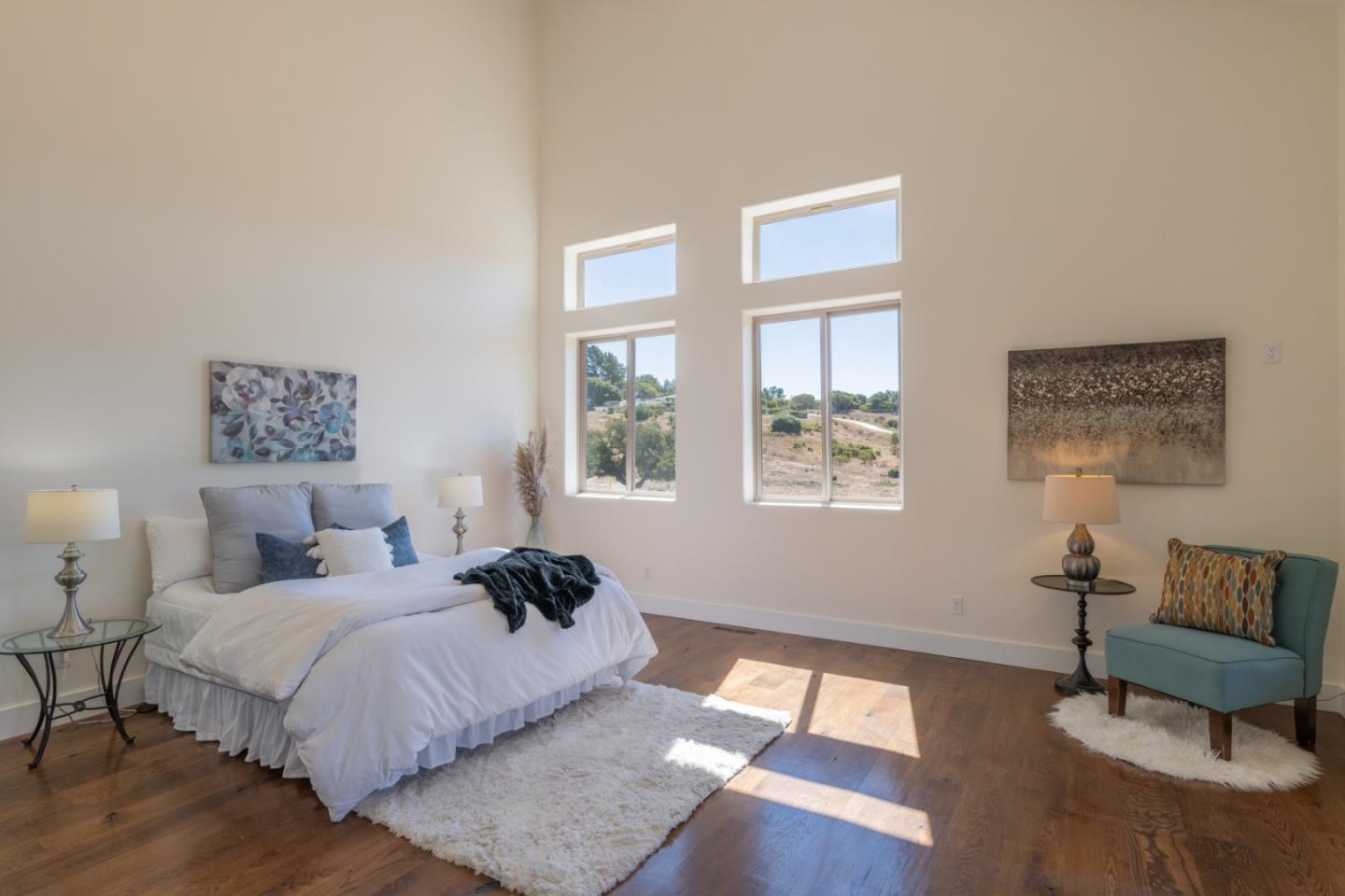 9020 Hidden Canyon Road Salinas, CA 93907 - Photo 39 of 58 a bed room with a bed a couch and a window