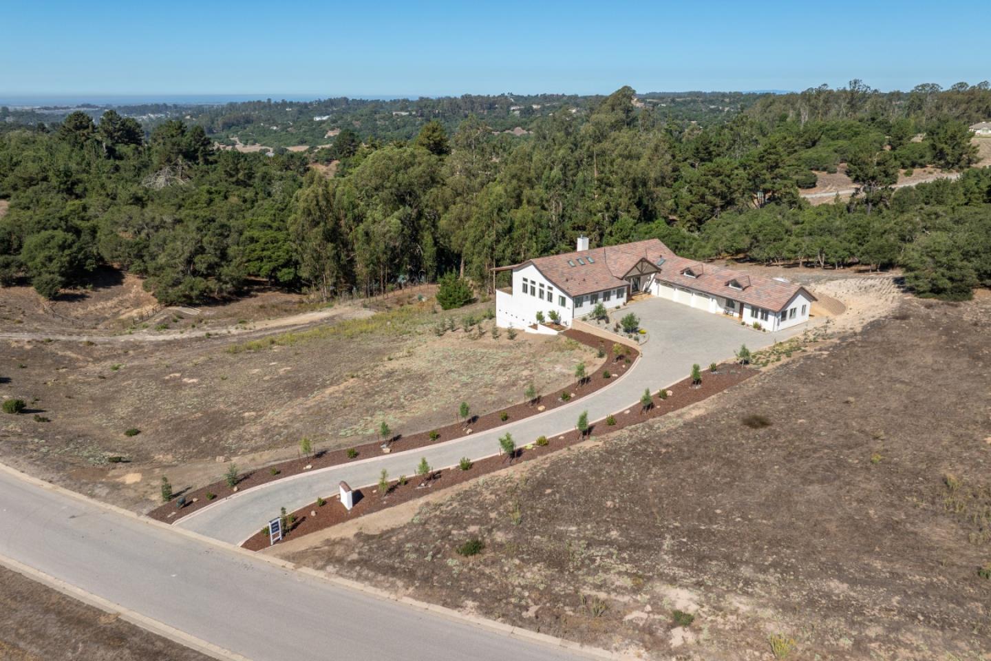 9020 Hidden Canyon Road Salinas, CA 93907 - Photo 4 of 58 an aerial view of a house with a yard