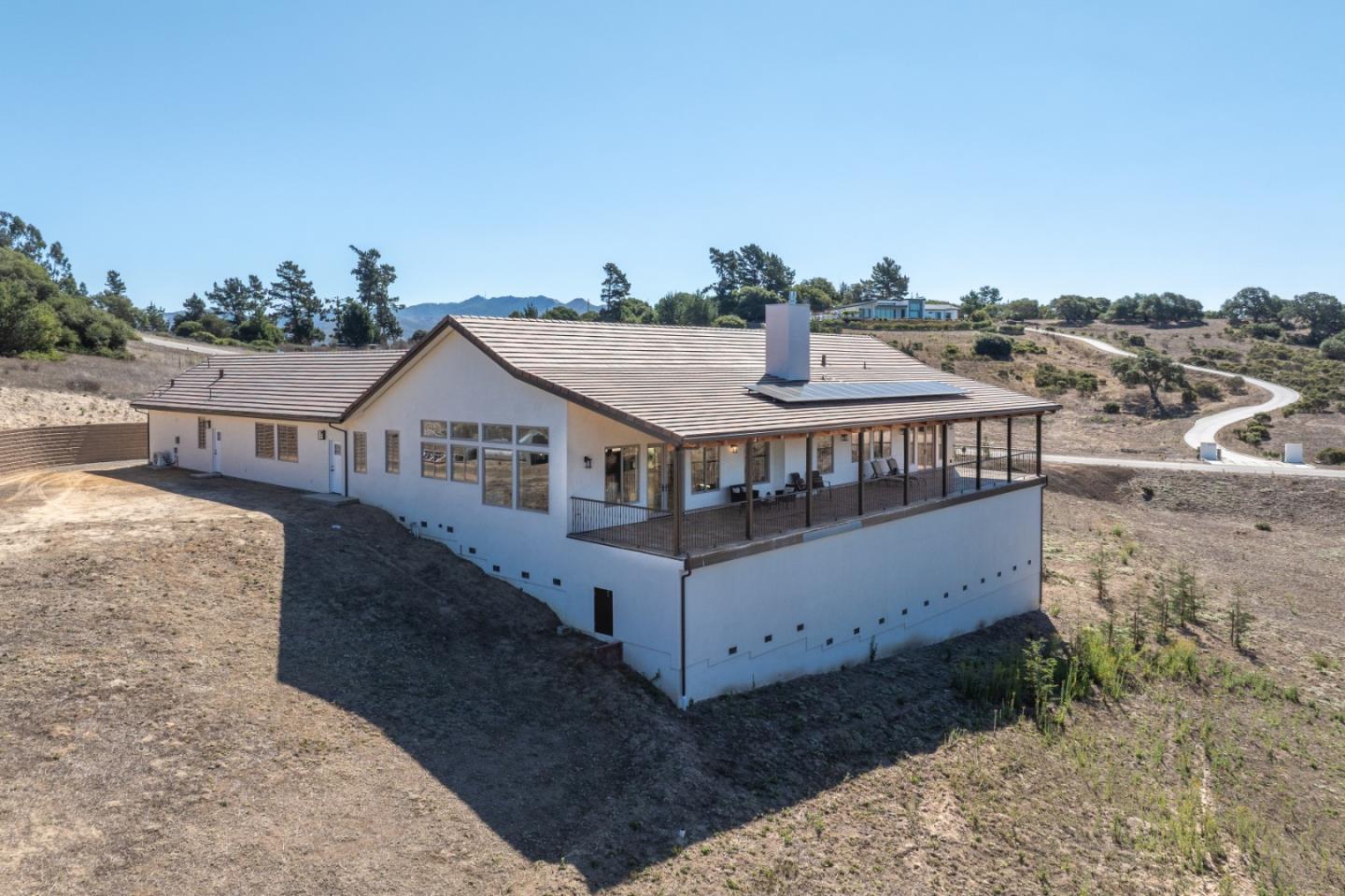 9020 Hidden Canyon Road Salinas, CA 93907 - Photo 9 of 58 a aerial view of a house with a yard and balcony