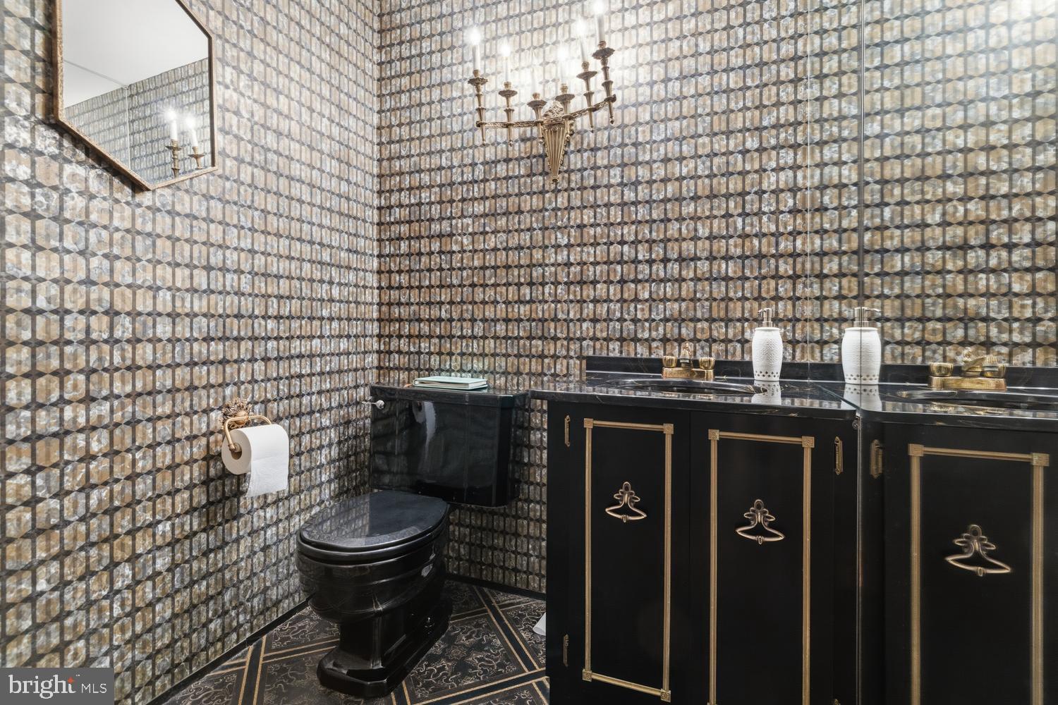 1074 Pheasant Road Rydal, PA 19046 - Photo 19 of 51 a bathroom with a toilet and a sink
