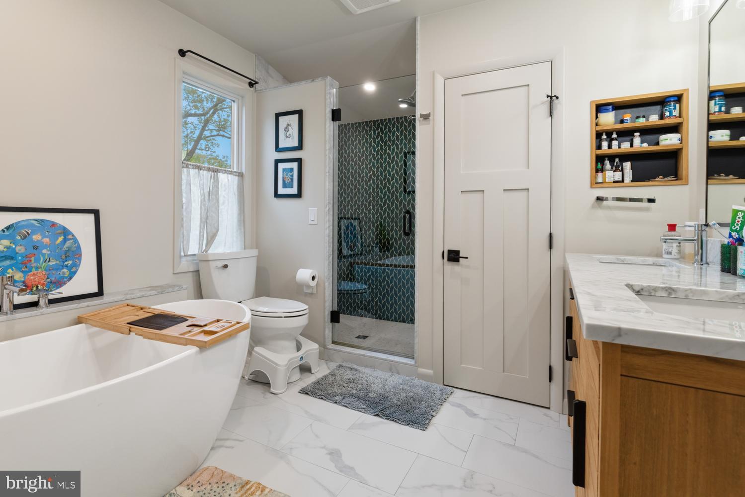 1074 Pheasant Road Rydal, PA 19046 - Photo 23 of 51 a bathroom with a sink a toilet and shower