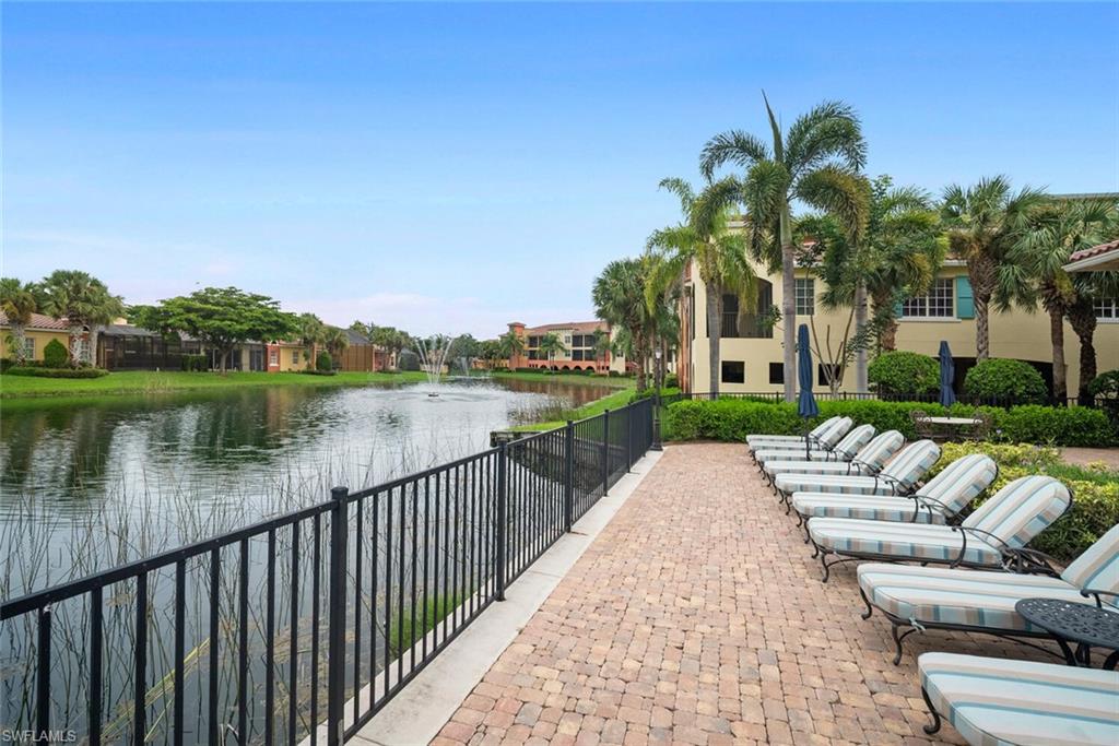 8581 Via Garibaldi Circle, Unit 201 Estero, FL 33928 - Photo 11 of 42 a view of a lake with a patio