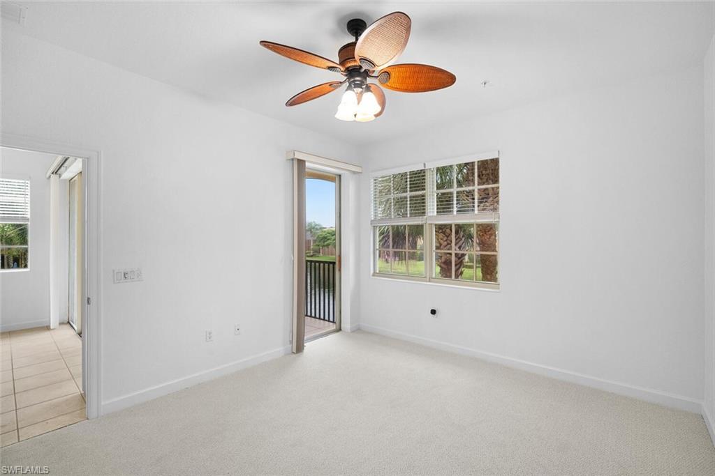8581 Via Garibaldi Circle, Unit 201 Estero, FL 33928 - Photo 25 of 42 a view of an empty room with a window