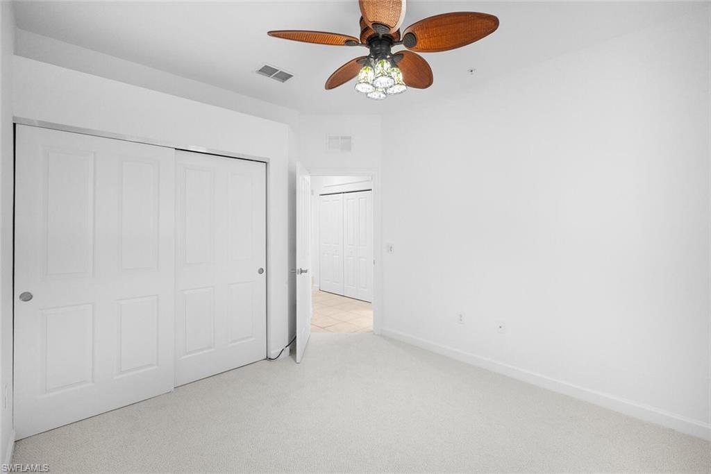 8581 Via Garibaldi Circle, Unit 201 Estero, FL 33928 - Photo 31 of 42 a view of an empty room