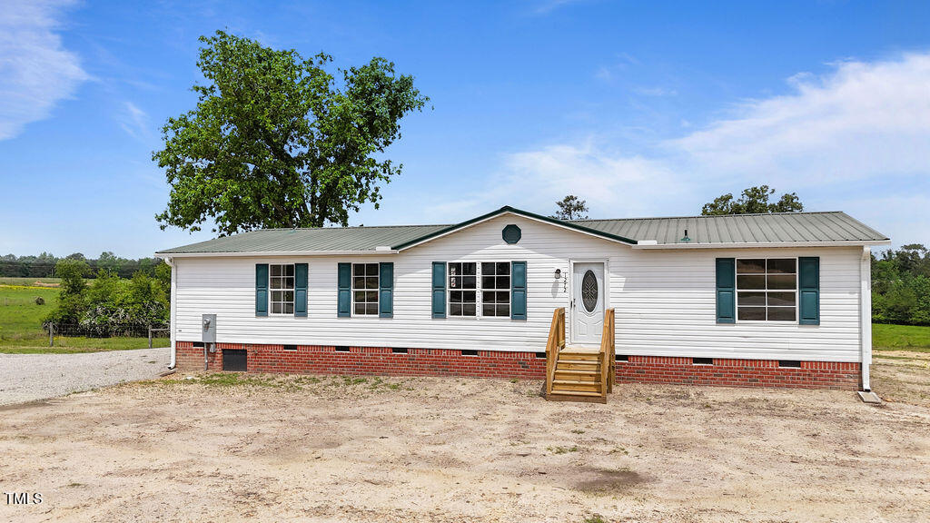 1272 Holder Road Lillington, NC 27546 - Photo 3 of 30 DJI_20250425002316_0010_D