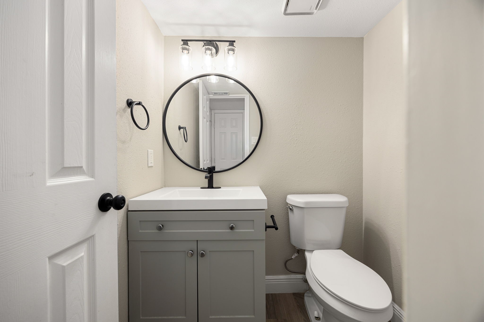 16919 Chapel Pines Drive, Unit 128 Spring, TX 77379 - Photo 11 of 24 A bright and functional half bathroom featuring a clean, modern vanity, updated fixtures, and a thoughtfully designed layout that offers both comfort and convenience.