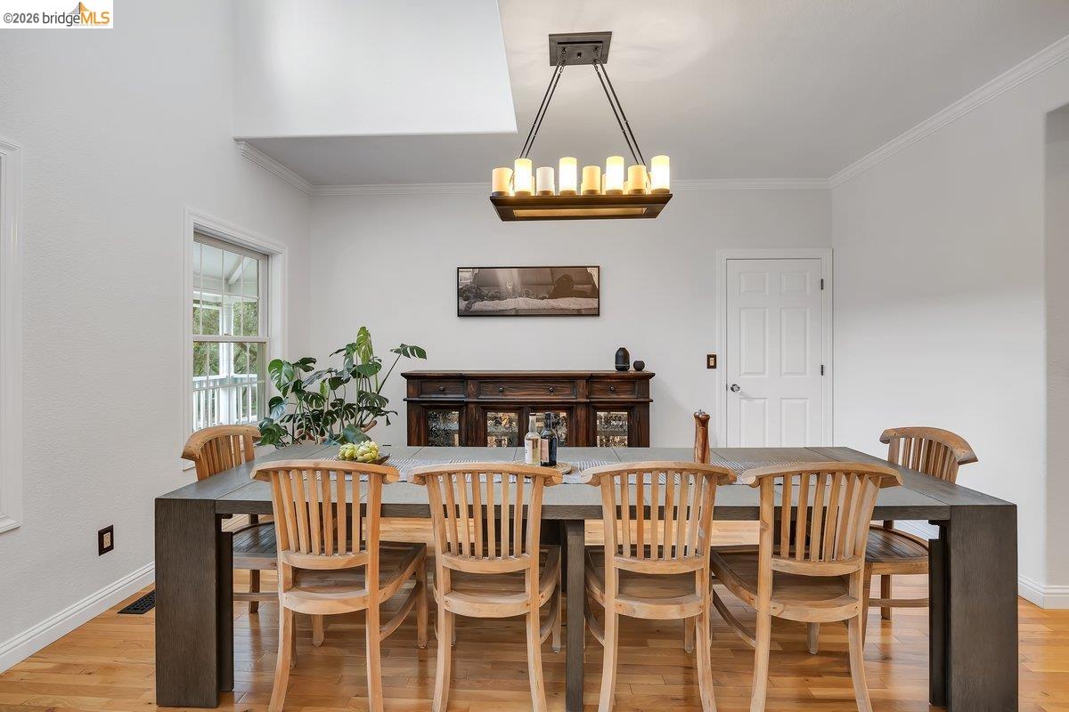 21950 Lyons Bald Mountain Road Sonora, CA 95370 - Photo 12 of 76 a view of a dining room with furniture and chandelier