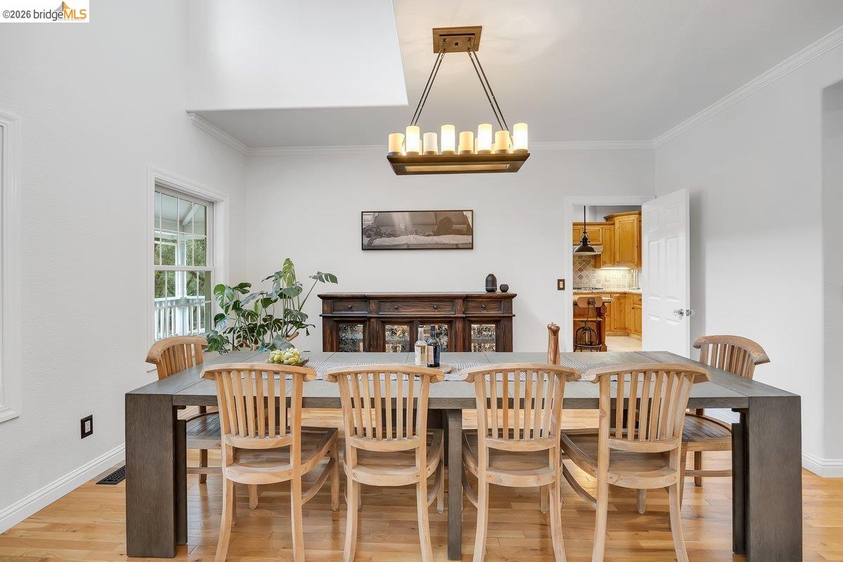 21950 Lyons Bald Mountain Road Sonora, CA 95370 - Photo 13 of 76 a view of a dining room with furniture and chandelier