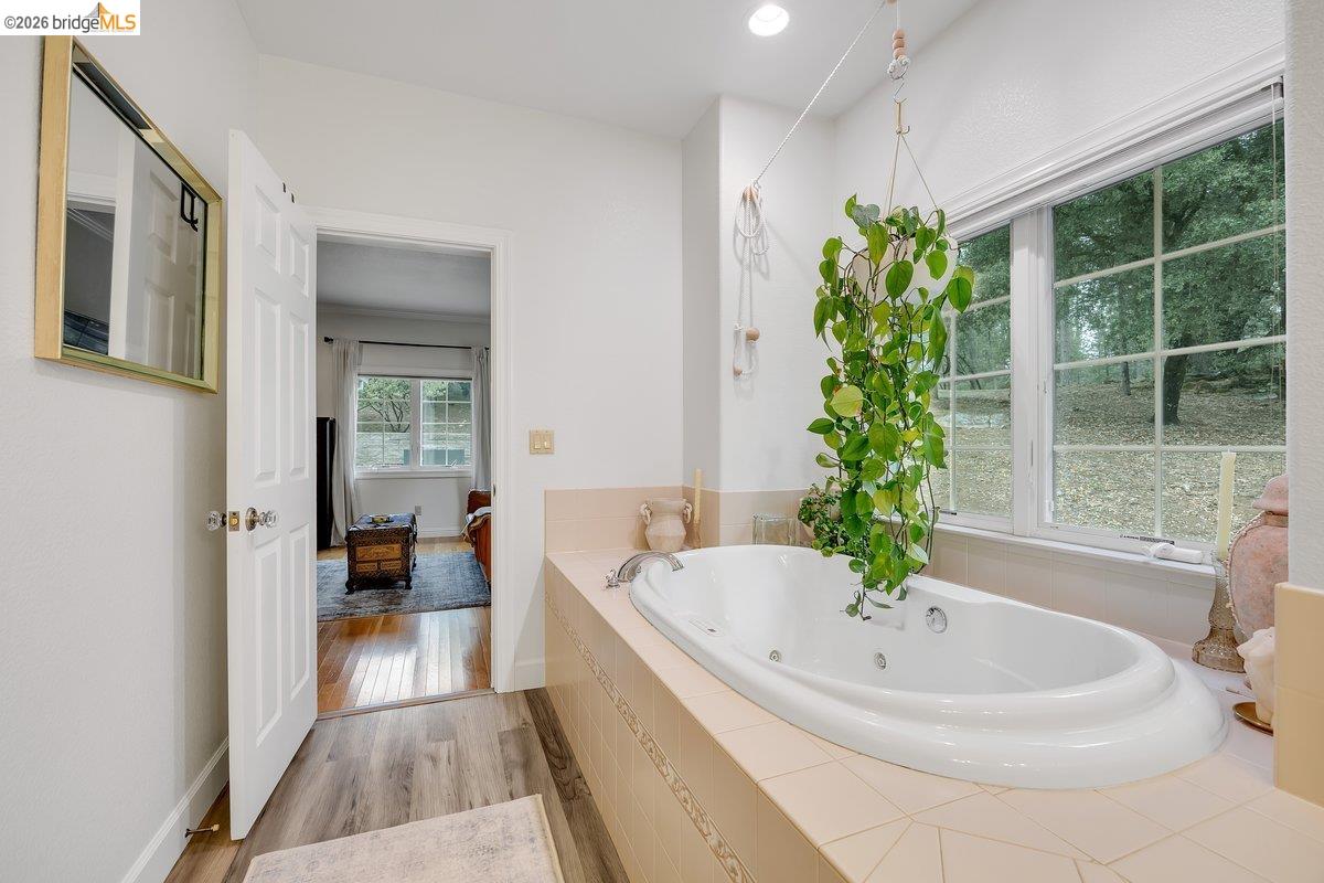 21950 Lyons Bald Mountain Road Sonora, CA 95370 - Photo 31 of 76 a bath tub sitting in a bathroom next to a tub