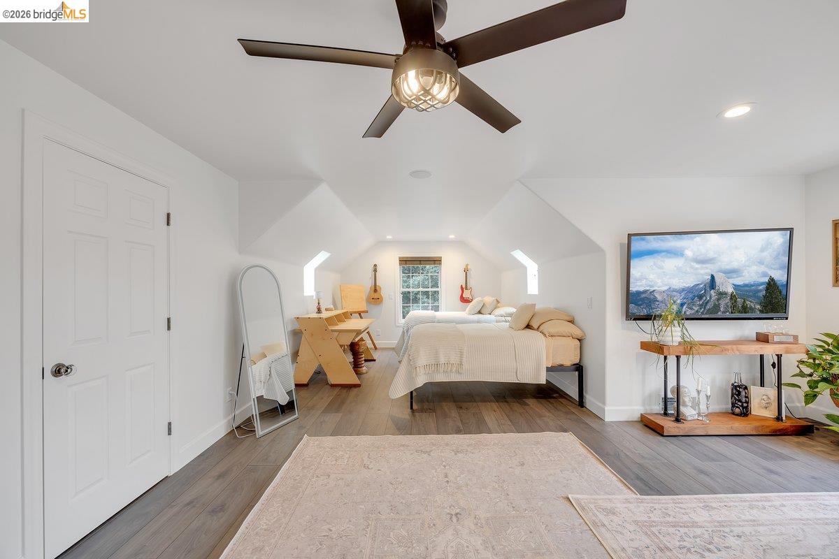 21950 Lyons Bald Mountain Road Sonora, CA 95370 - Photo 36 of 76 Spacious attic conversion featuring vaulted ceilings and recessed lighting