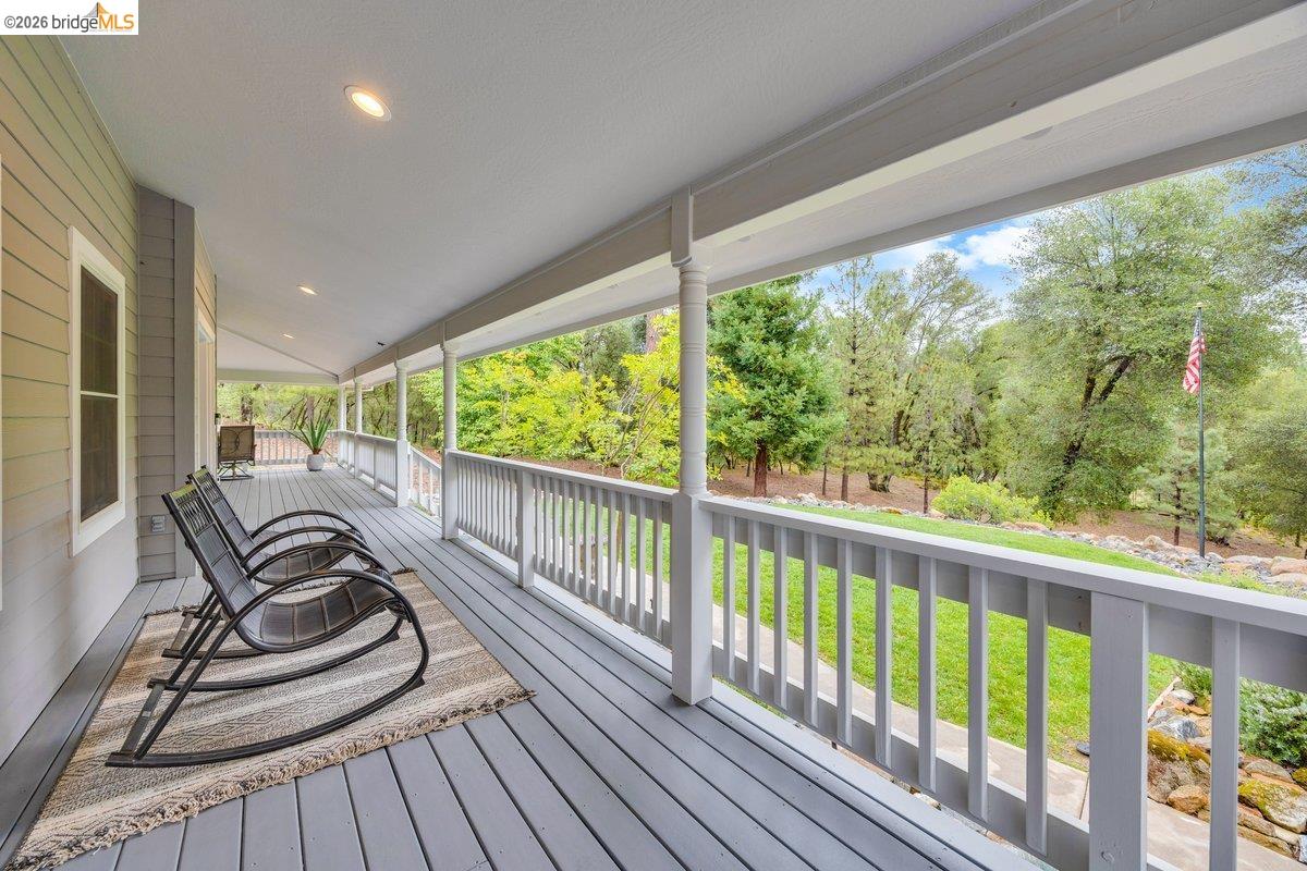 21950 Lyons Bald Mountain Road Sonora, CA 95370 - Photo 45 of 76 a view of a balcony with chairs