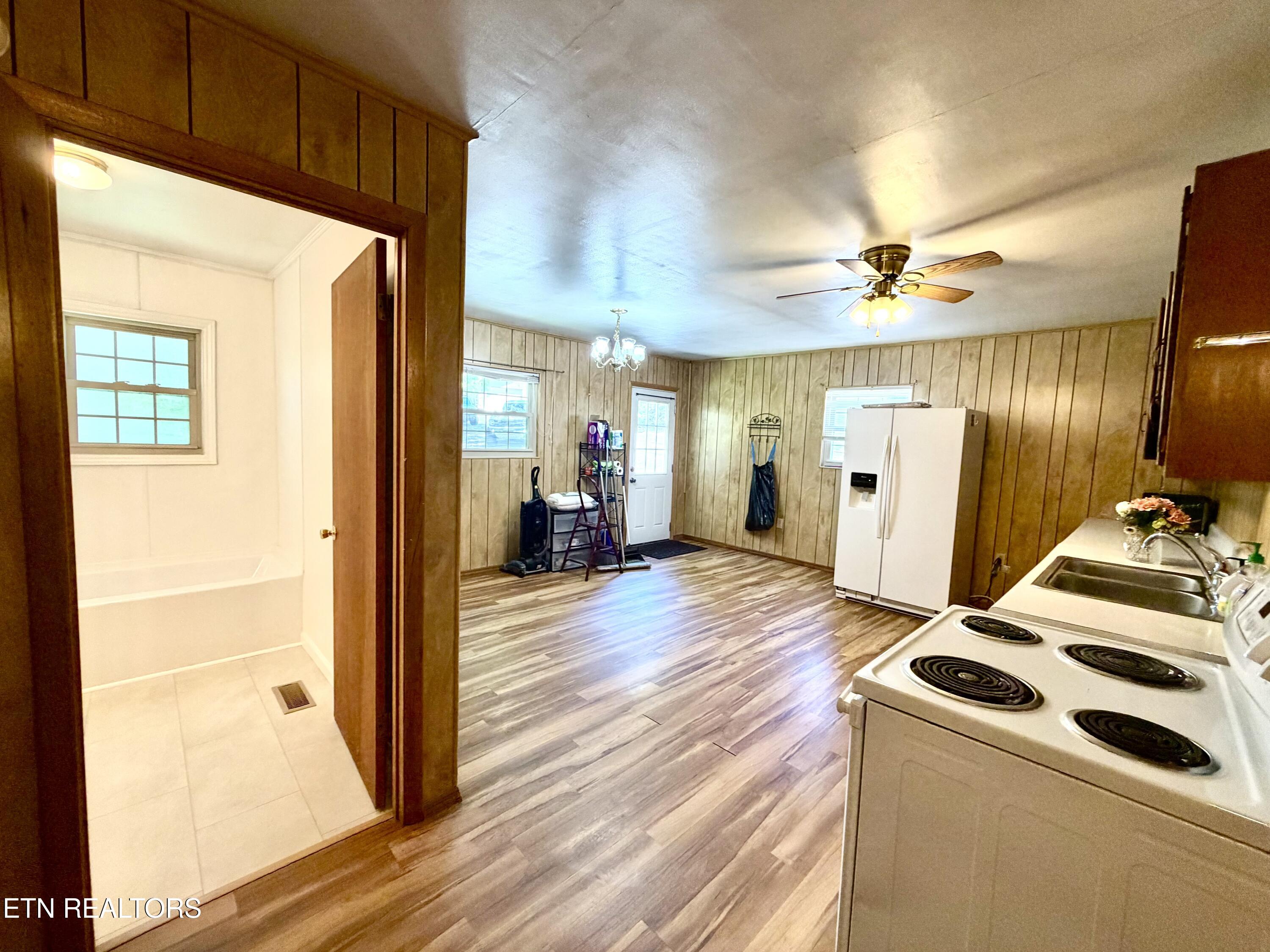 4906 Shady Road Strawberry Plains, TN 37871 - Photo 15 of 41 Hall to Kitchen and Bathroom