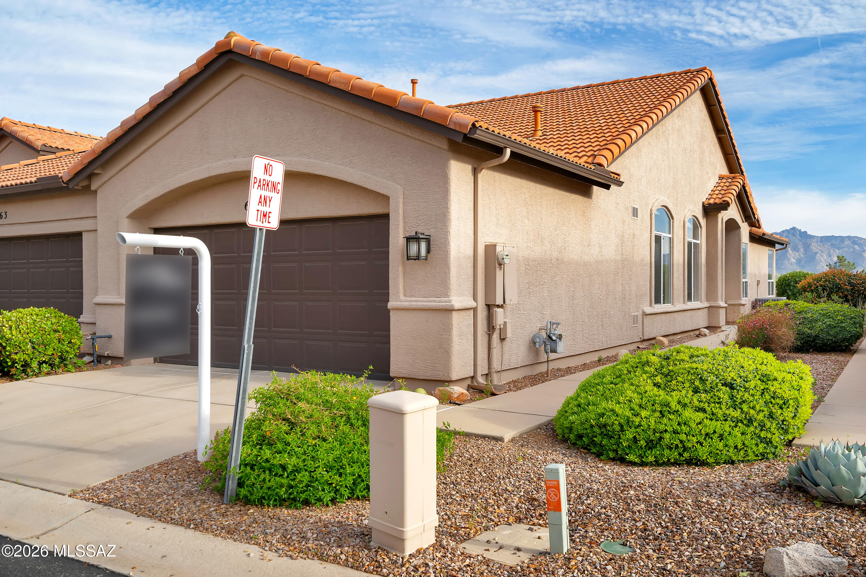 64351 East Wind Ridge Circle Tucson, AZ 85739 - Photo 2 of 41 a view of a house with potted plants