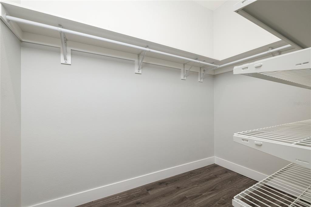 416 Indiana Avenue Crystal Beach, FL 34683 - Photo 15 of 60 a view of a room with wooden floor