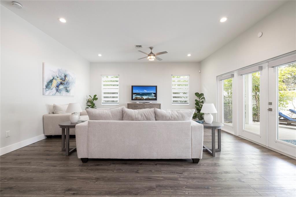 416 Indiana Avenue Crystal Beach, FL 34683 - Photo 23 of 60 a living room with furniture and wooden floor