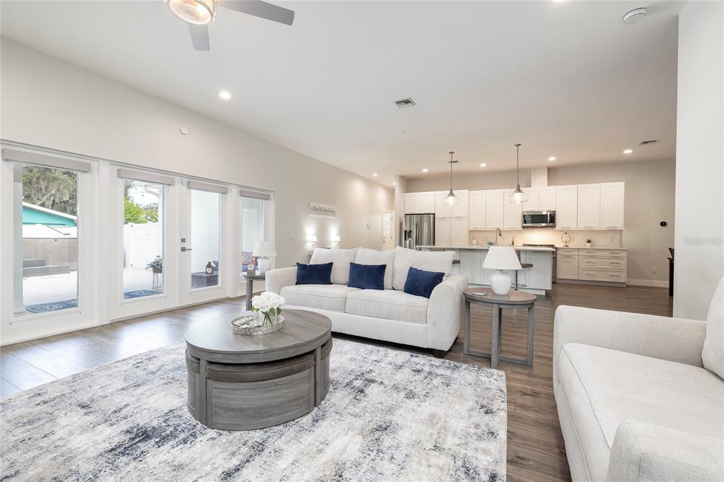 416 Indiana Avenue Crystal Beach, FL 34683 - Photo 24 of 60 a living room with furniture and view of kitchen