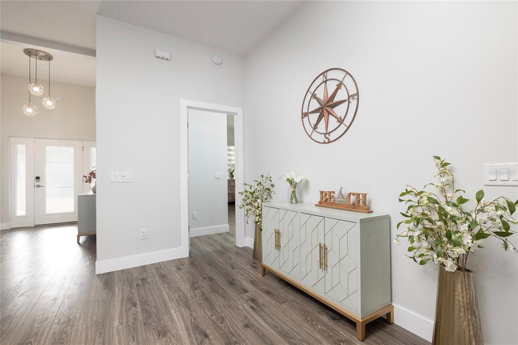 416 Indiana Avenue Crystal Beach, FL 34683 - Photo 26 of 60 a view of dining room with wooden floor