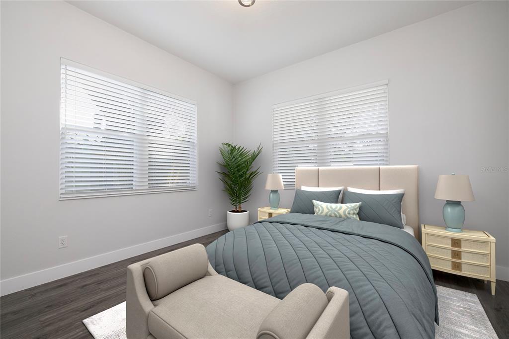 416 Indiana Avenue Crystal Beach, FL 34683 - Photo 30 of 63 a bedroom with a bed and a window