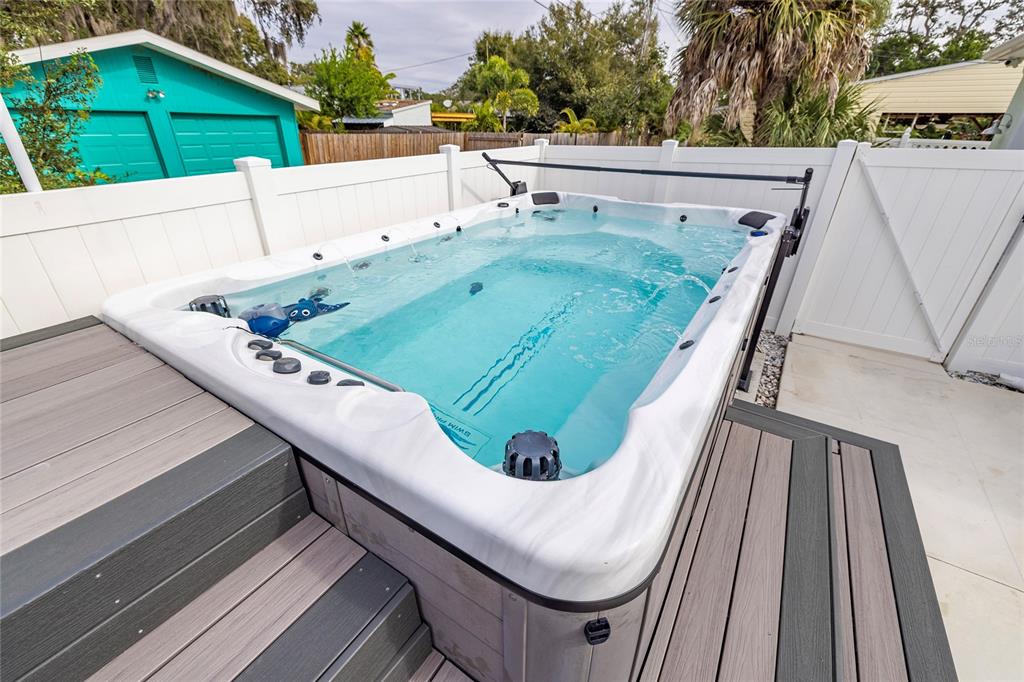 416 Indiana Avenue Crystal Beach, FL 34683 - Photo 34 of 60 a view of a backyard with sitting area