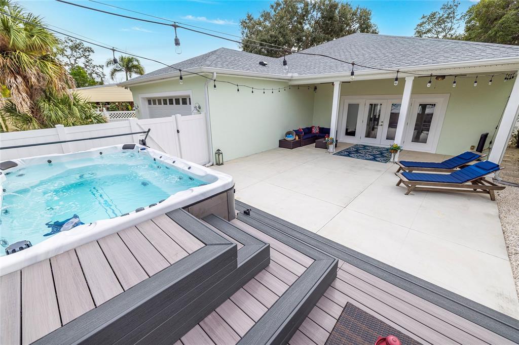 416 Indiana Avenue Crystal Beach, FL 34683 - Photo 45 of 63 a view of a patio with furniture