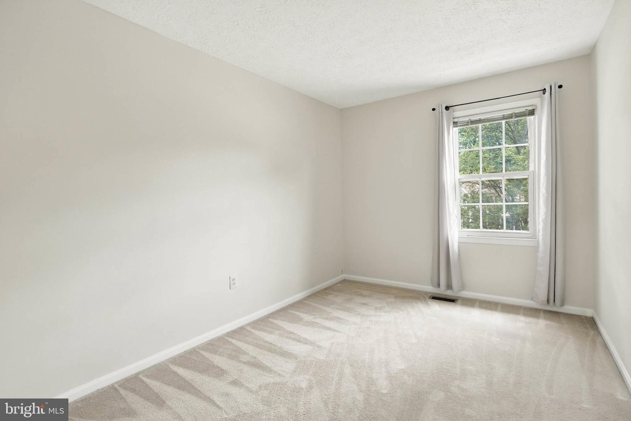 2605 Bainbridge Lane Silver Spring, MD 20906 - Photo 22 of 33 an empty room with a window