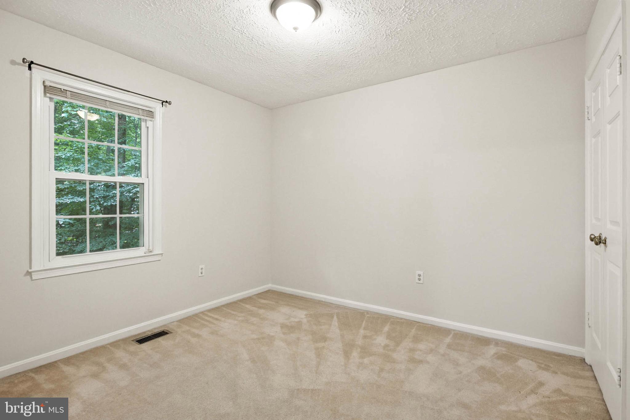 2605 Bainbridge Lane Silver Spring, MD 20906 - Photo 27 of 33 an empty room with a window