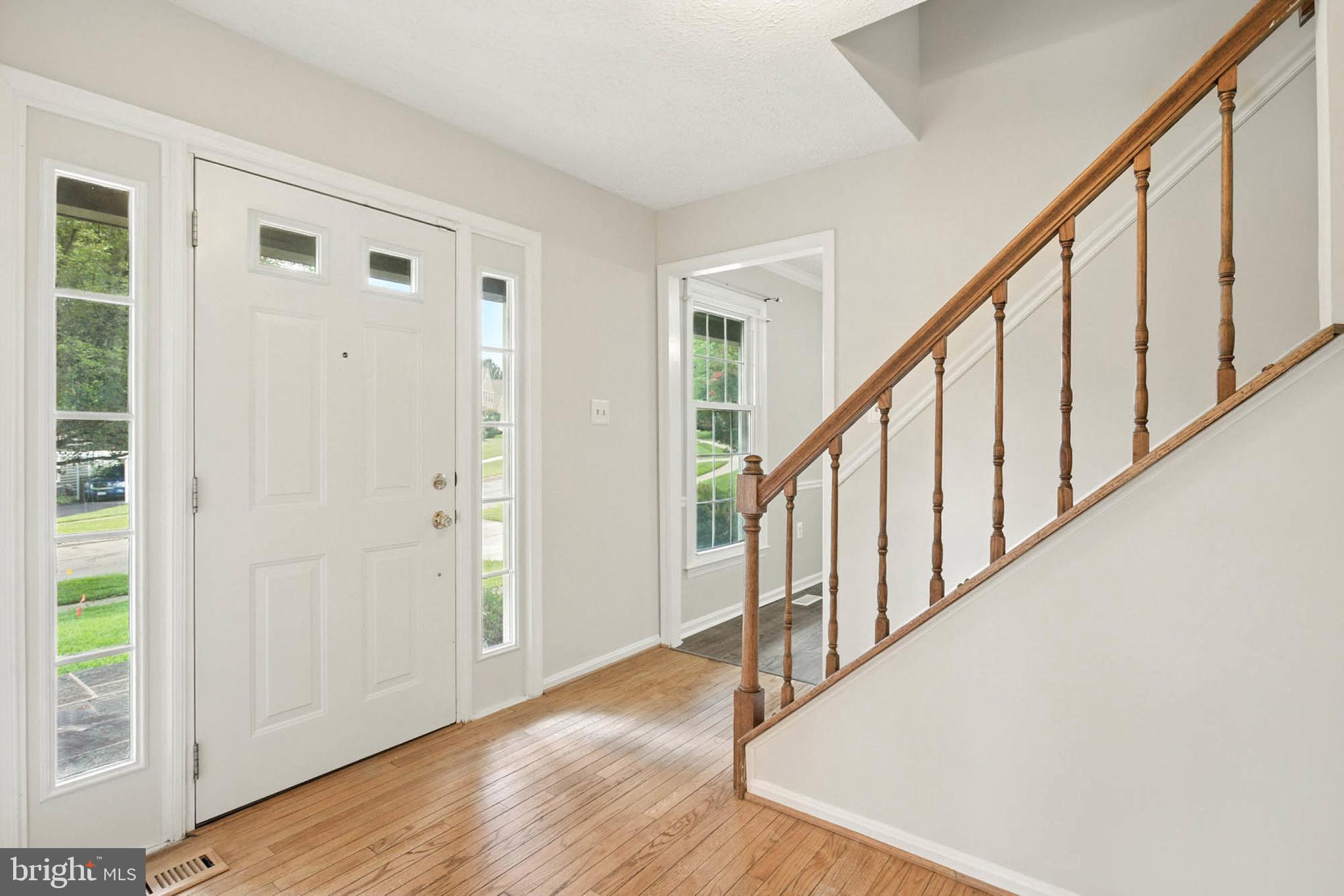 2605 Bainbridge Lane Silver Spring, MD 20906 - Photo 3 of 33 a view of an entryway with wooden floor