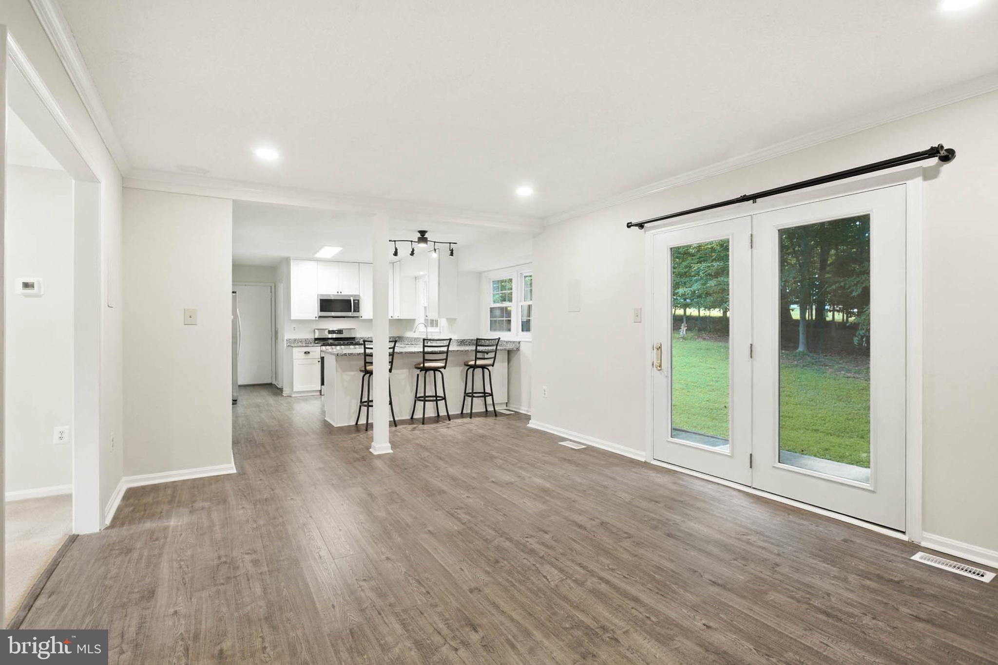 2605 Bainbridge Lane Silver Spring, MD 20906 - Photo 8 of 33 a view of kitchen with furniture and wooden floor