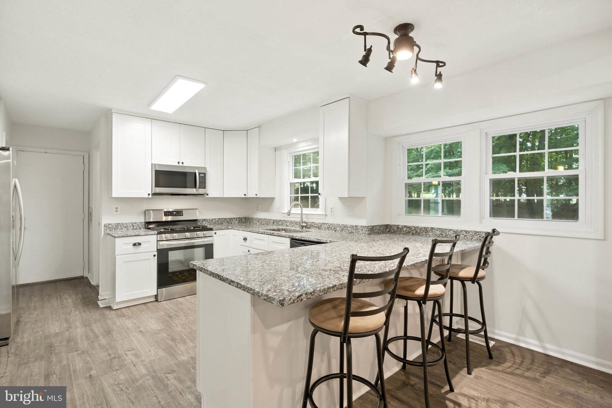 2605 Bainbridge Lane Silver Spring, MD 20906 - Photo 9 of 33 a view of a dining room with furniture window and outside view