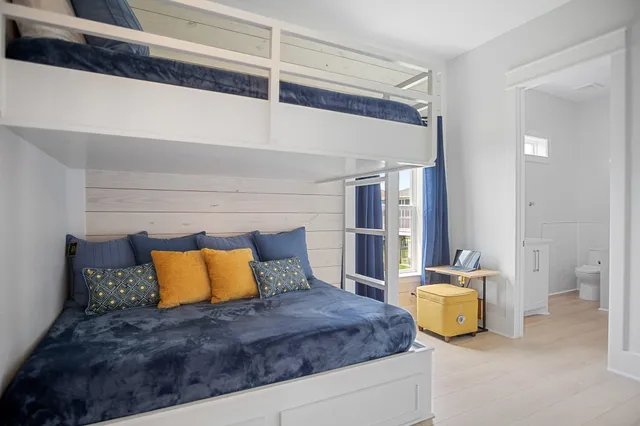 a bedroom with a bed and walk in closet