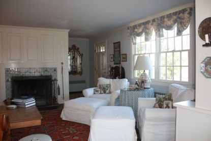 200 Ocean Road Bridgehampton, NY 11932 - Photo 4 of 17 a living room with furniture and a fireplace