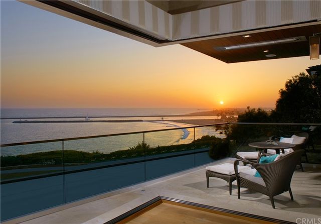 a view of swimming pool with seating space