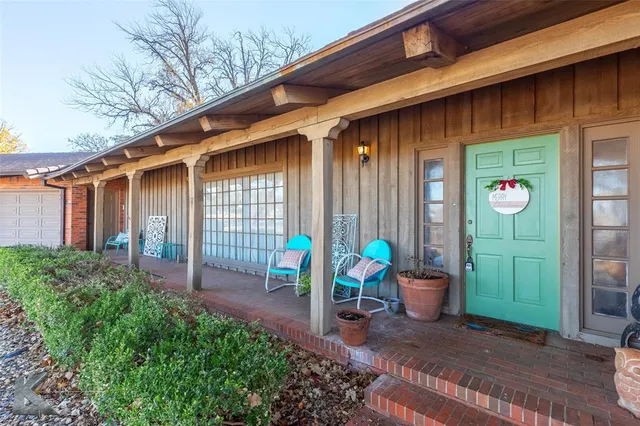 a front view of a house with patio