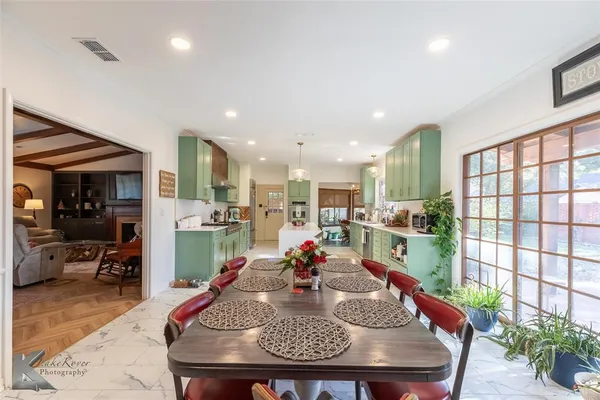 a view of a dining room and livingroom furniture