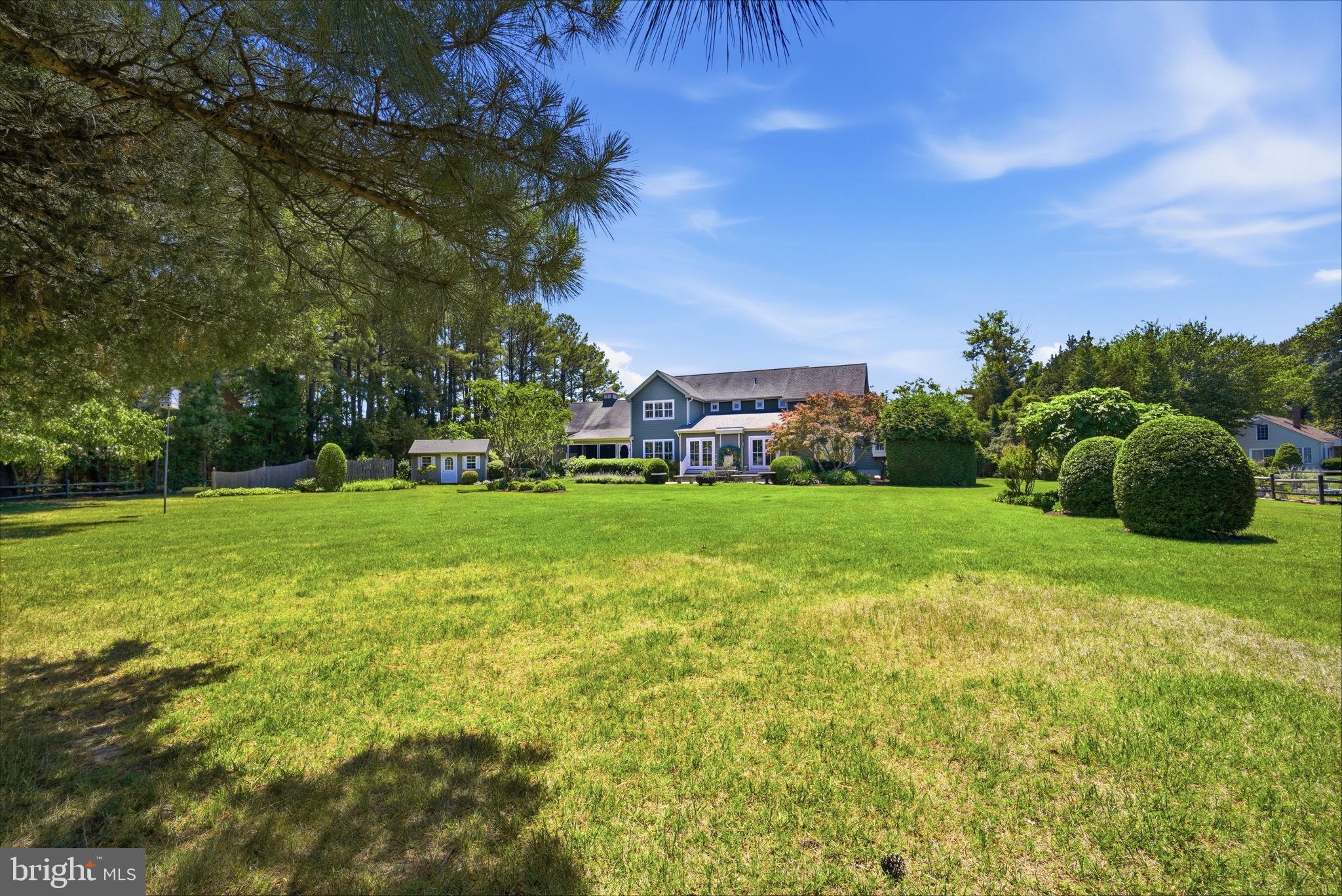 26226 Langs Landing Road Oxford, MD 21654 - Photo 45 of 48 a view of building with garden