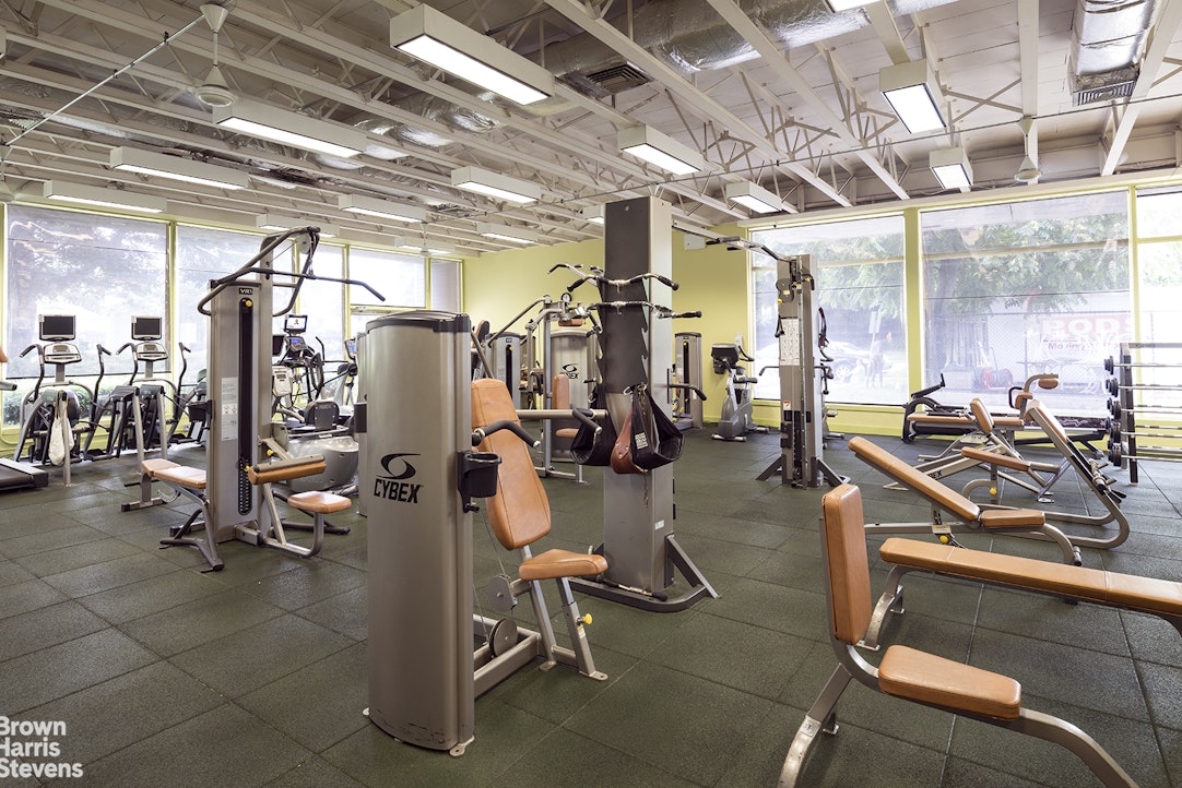 5700 Arlington Avenue, Unit 20S Bronx, NY 10471 - Photo 12 of 15 a view of a room with gym equipment