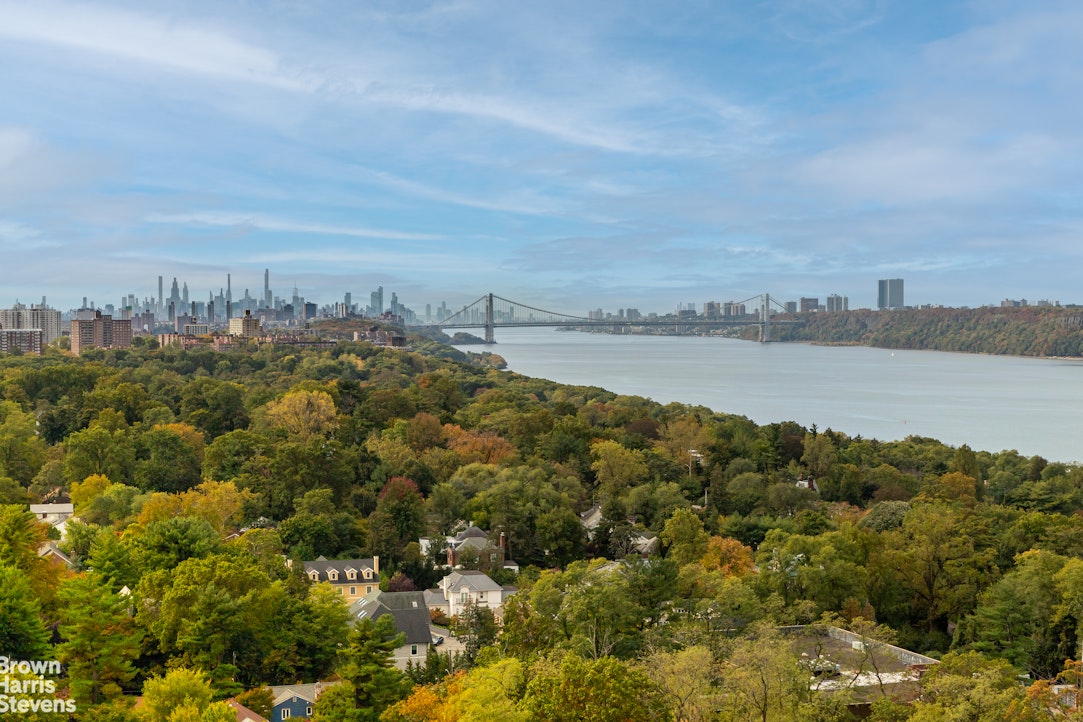 5700 Arlington Avenue, Unit 20S Bronx, NY 10471 - Photo 6 of 15 a view of a lake with a city