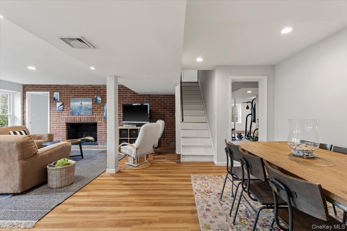 8 Douglas Circle Rye, NY 10580 - Photo 29 of 36 Accent brick wall in recreation room.