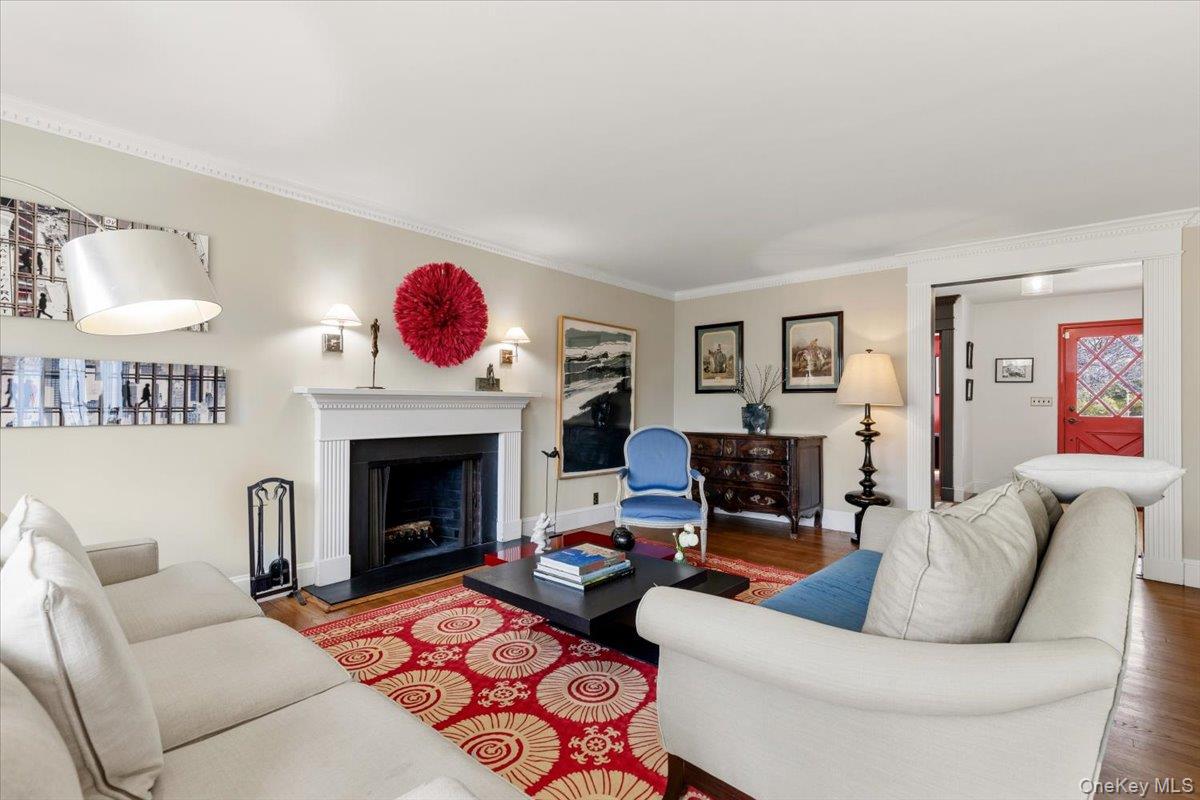 8 Douglas Circle Rye, NY 10580 - Photo 7 of 36 The central wood-burning fireplace invites warm and ambient gatherings.