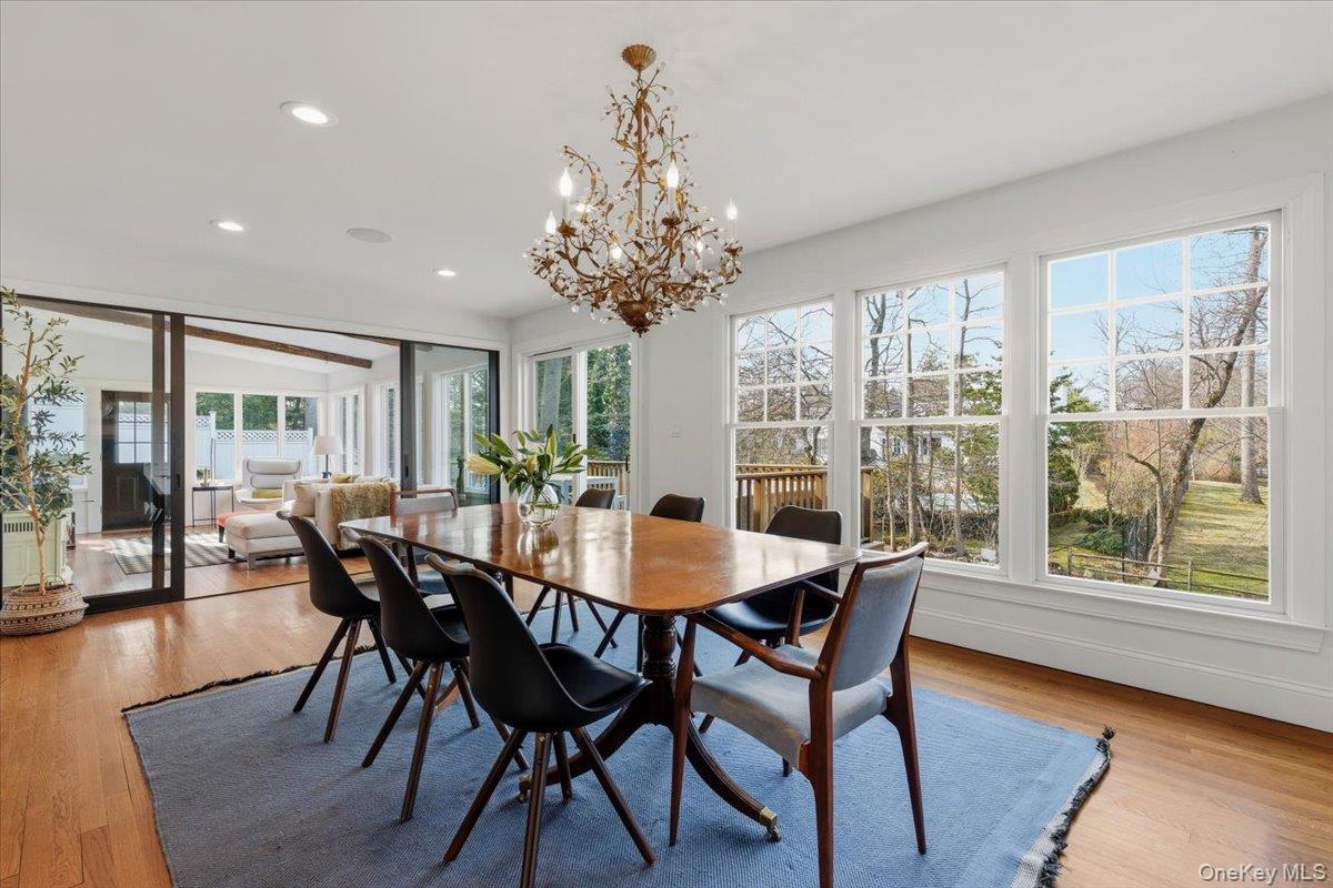 8 Douglas Circle Rye, NY 10580 - Photo 8 of 36 Entertaining has never been easier with extra seating space and tree-canopy views.