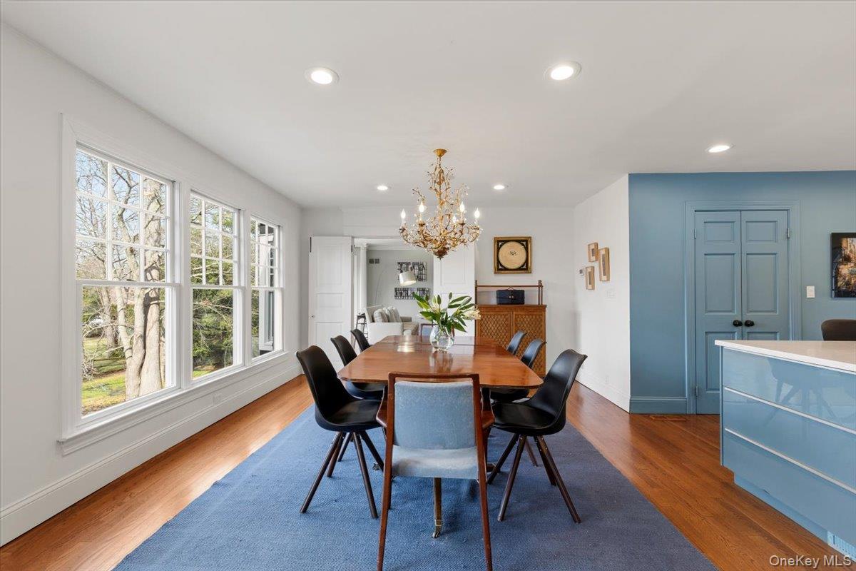 8 Douglas Circle Rye, NY 10580 - Photo 9 of 36 The elegant dining space ties the family room and living room into one long line of sight.
