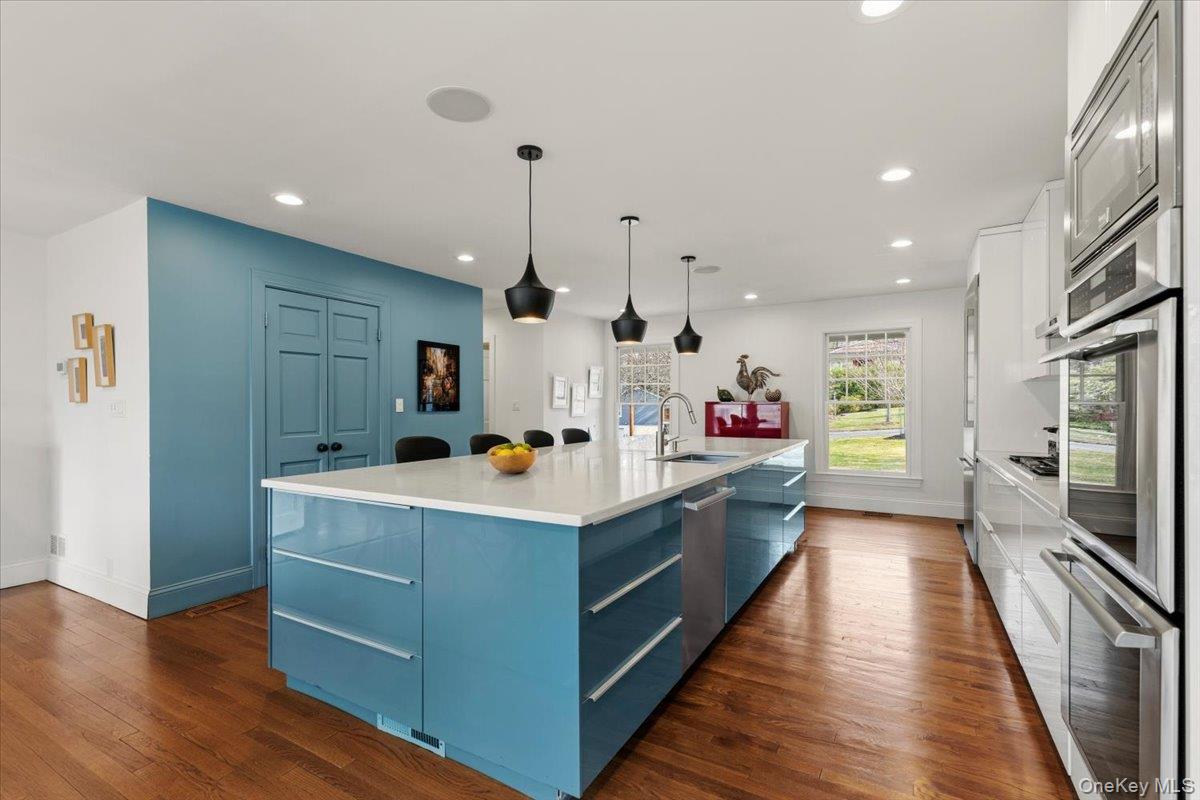 8 Douglas Circle Rye, NY 10580 - Photo 10 of 36 With windows on either side, the chef's kitchen is as beautifully designed as it is functional.