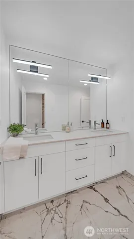 a kitchen with lots of counter top space and living room