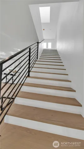 a bathroom with a toilet a sink and bathtub