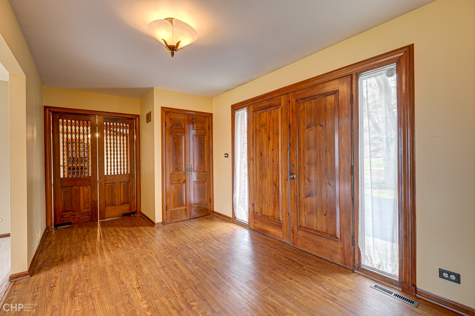 3027 Red Barn Road Crystal Lake, IL 60012 - Photo 11 of 40 a view of a room with wooden floor and a window