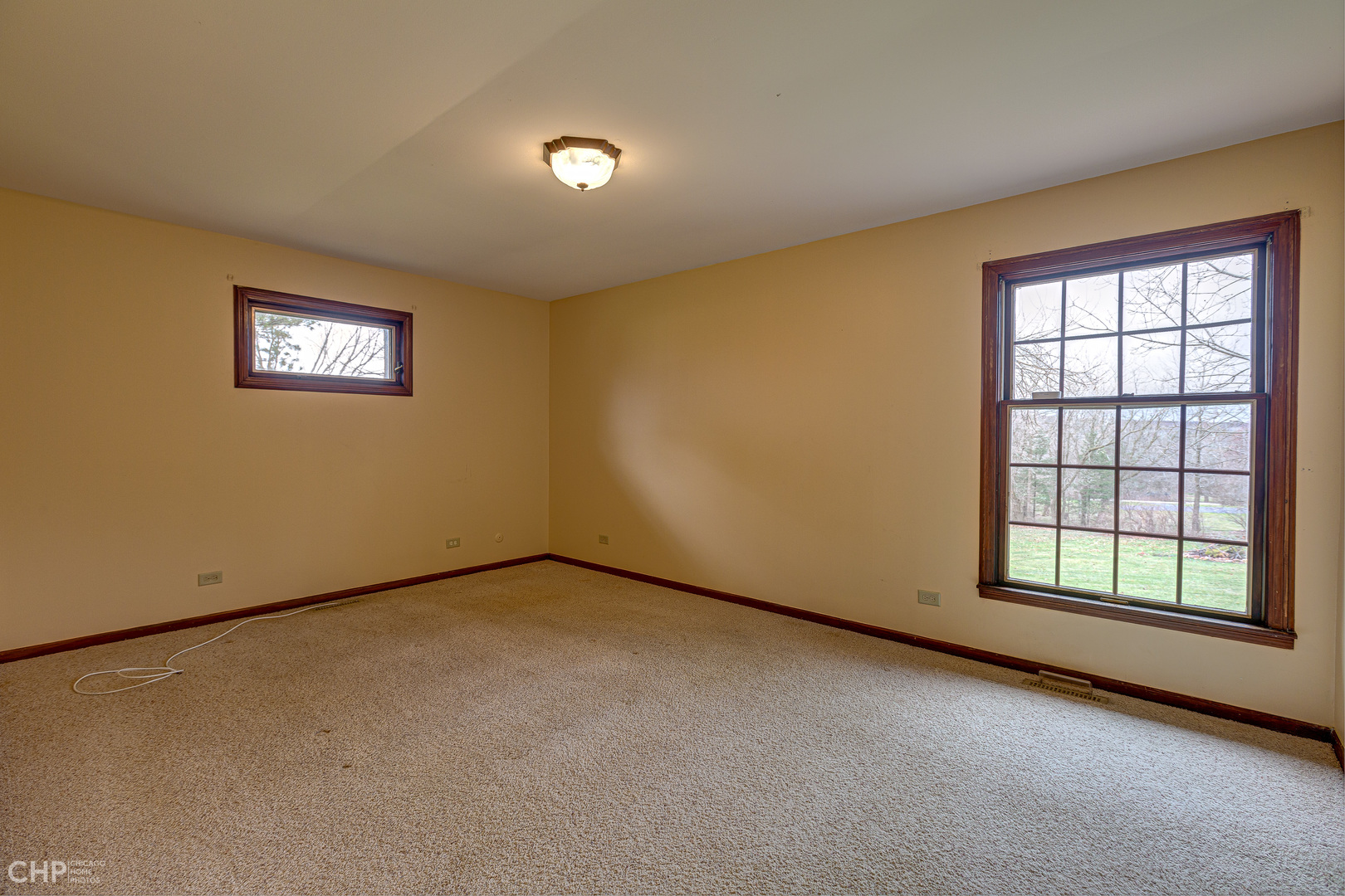 3027 Red Barn Road Crystal Lake, IL 60012 - Photo 18 of 40 an empty room with a window