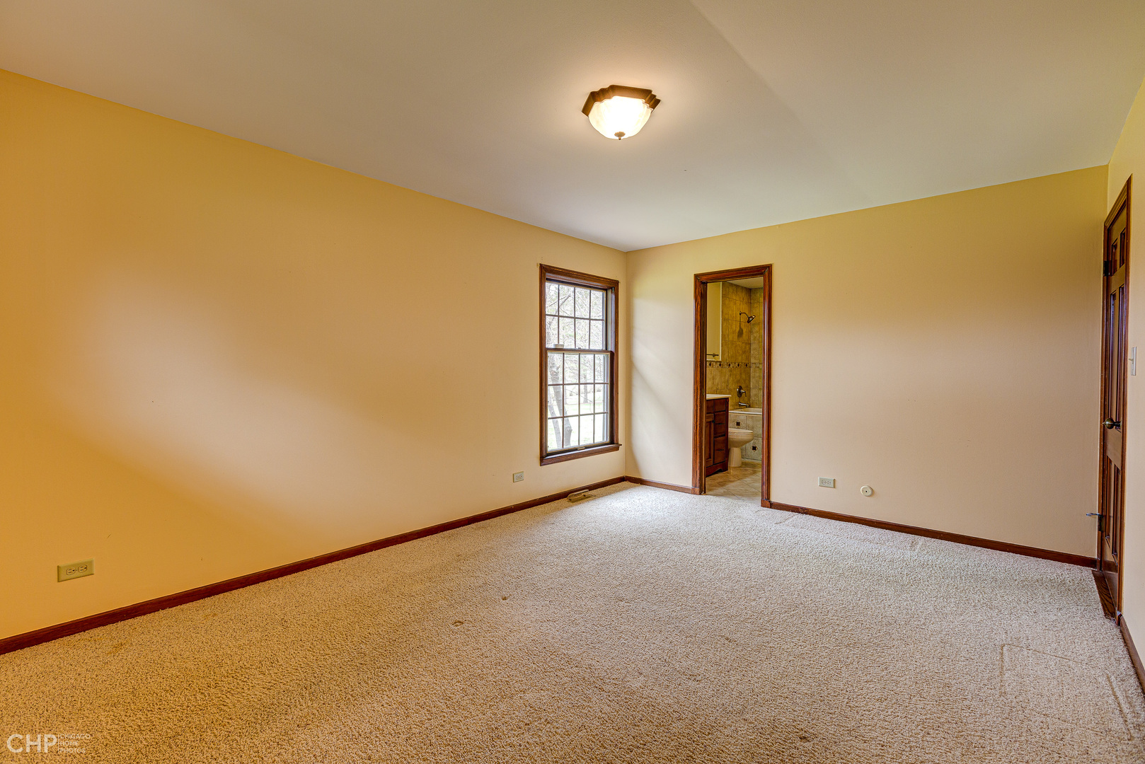 3027 Red Barn Road Crystal Lake, IL 60012 - Photo 19 of 40 a view of an empty room with a window