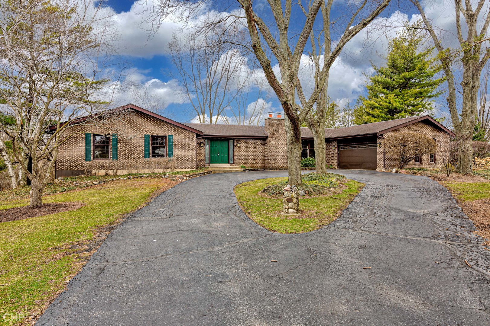 3027 Red Barn Road Crystal Lake, IL 60012 - Photo 2 of 40 a front view of a house with yard and green space