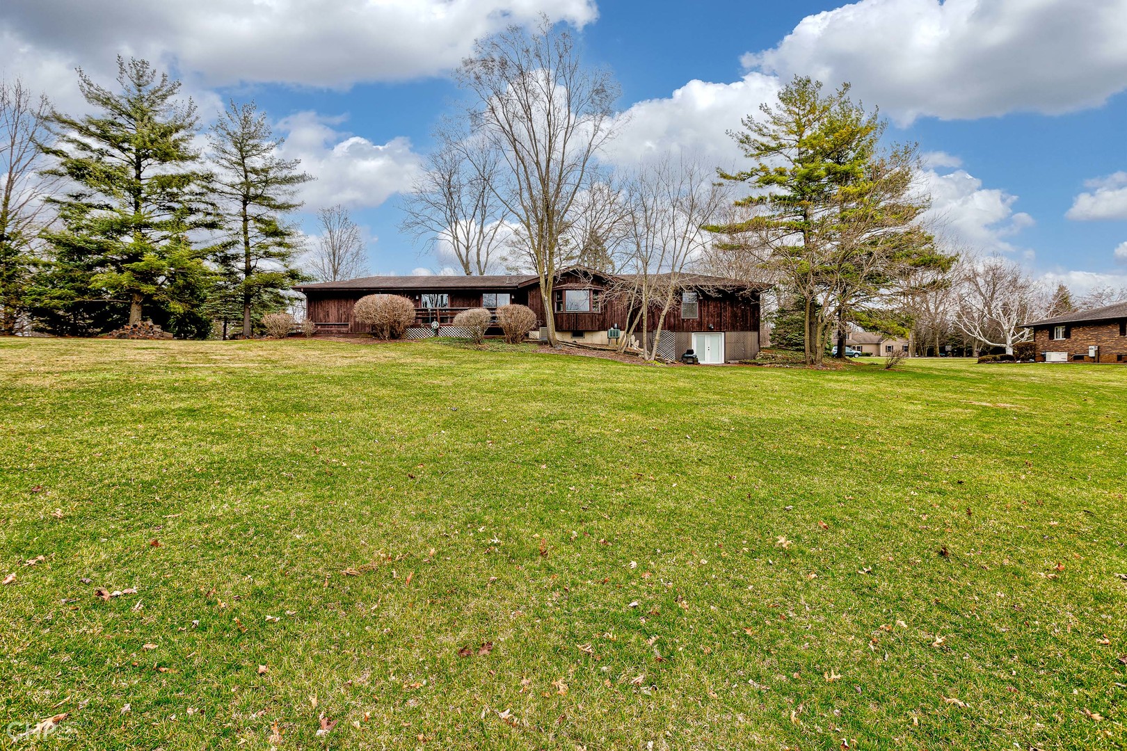 3027 Red Barn Road Crystal Lake, IL 60012 - Photo 37 of 40 a backyard of a house with lots of green space